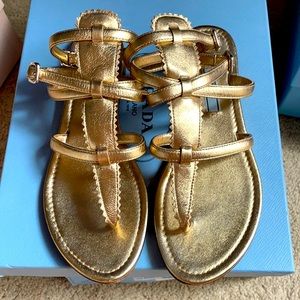 Gold gladiator Prada sandals